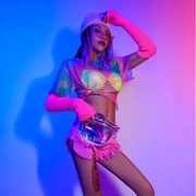 A rave girl wearing pink tie dye top and neon underwear for raves.