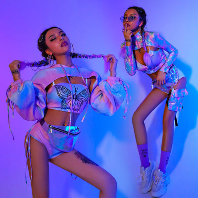 Two rave girls wearing holographic butterfly rave two piece sets.