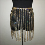 Gold sequin taassel skirt for raves or music festivals.