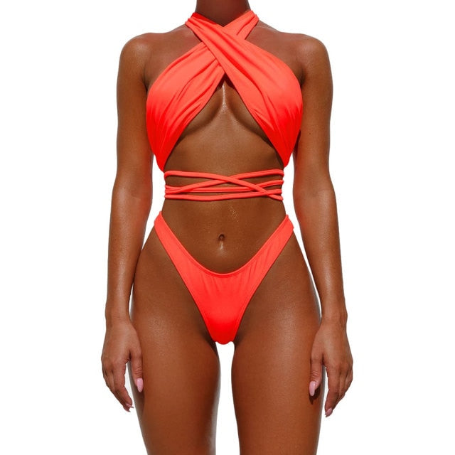 A rave girl wearing orange rave bikini two piece set.