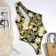 One piece black and gold paisley one shoulder bikini for raves.