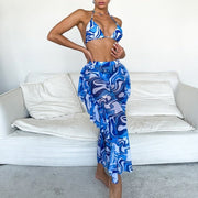 A rave girl wearing blue ruffle mesh bikini three piece set.