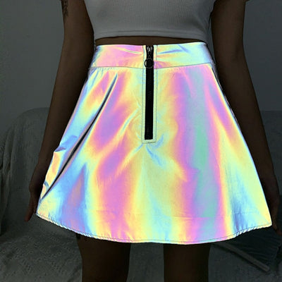 A rave girl wearing high waisted reflective skirt to a rave or music festival.