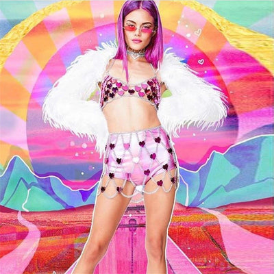 A rave girl wearing rave two piece set with heart shaped sequin for raves or music festival.