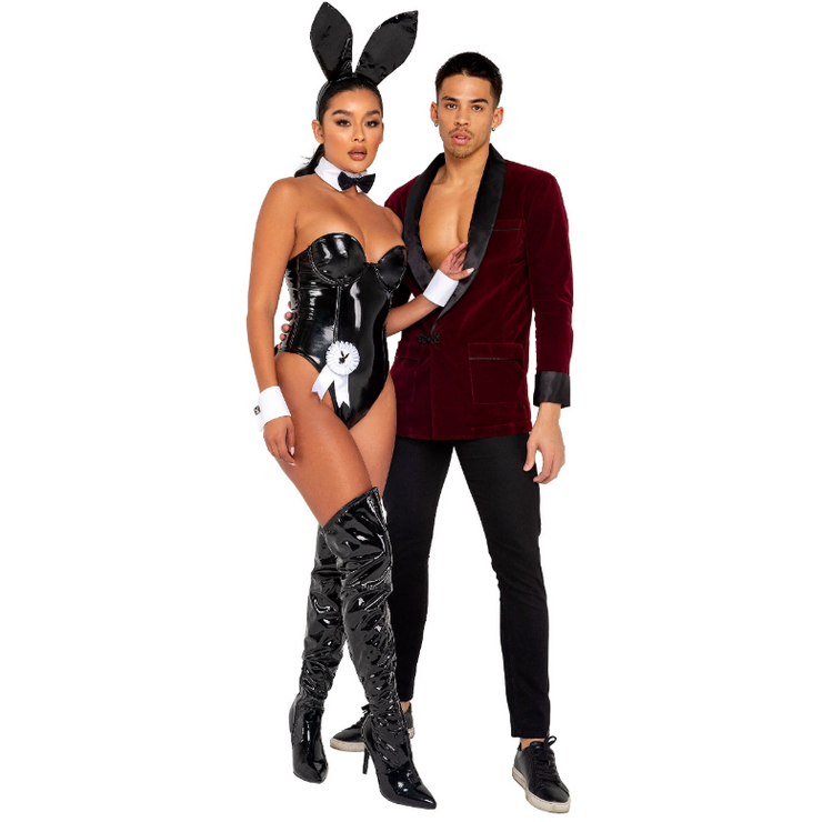 A rave girl wearing a vinyl playboy bunny costume to a rave or music festival.