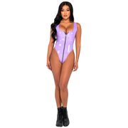 A woman wearing a lavender vinyl rave bodysuit to a rave or music festival.