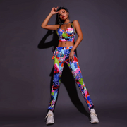 A rave girl wearing graffiti print two piece set to a music festival or rave.