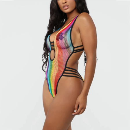 A woman wearing see through fishnet one piece bikino for raves.