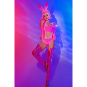 A rave girl wearing pink bunny rave costume with wigs.